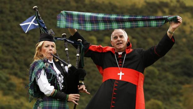 File photo of Cardinal O'Brien with the world's fi