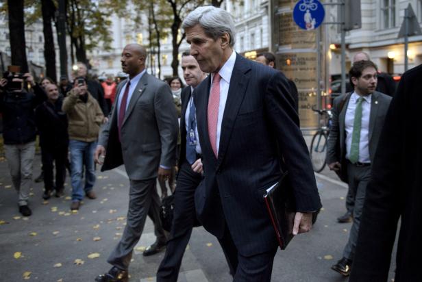 U.S. Secretary of State John Kerry walks to a meeting with his Iranian counterpart Javad Zarif in Vienna