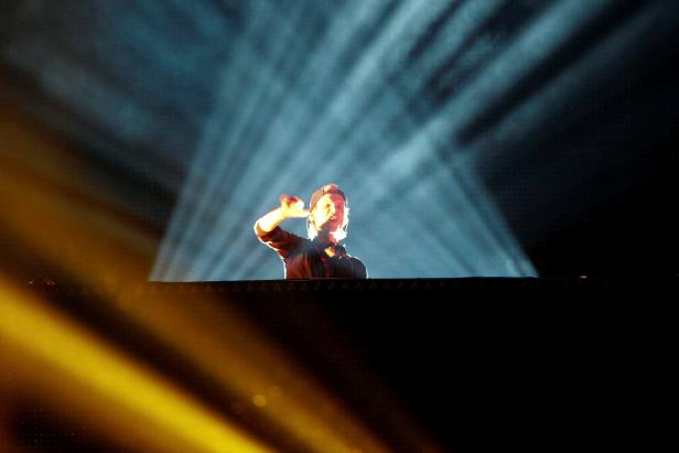 FILE PHOTO: DJ Avicii performs during a concert at Brooklyn's Barclay's Center in New York
