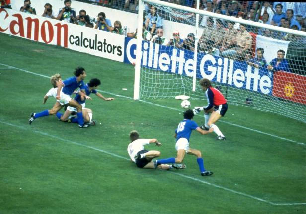 FILE PHOTO: Paolo Rossi scores a goal for Italy