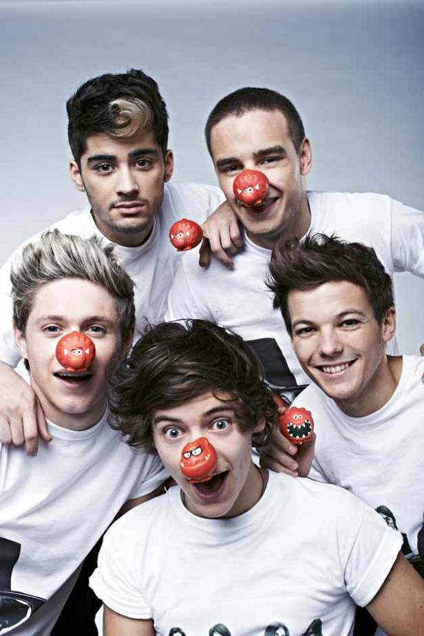 Die Band One Direction posiert mit roten Nasen für die Wohltätigkeitsorganisation Comic Relief.