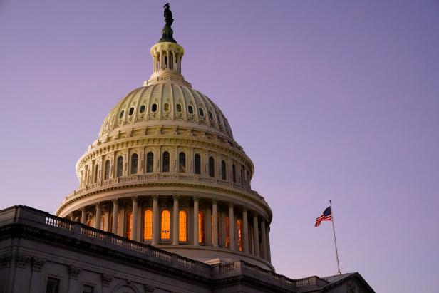 The U.S. Capitol is seen the night before Joe Biden's presidential inauguration in Washington