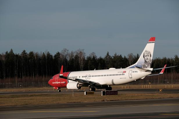 FILE PHOTO: Norwegian Air Sweden Boeing 737-800 plane SE-RRJ taxies to take-off in Riga International Airport in Riga