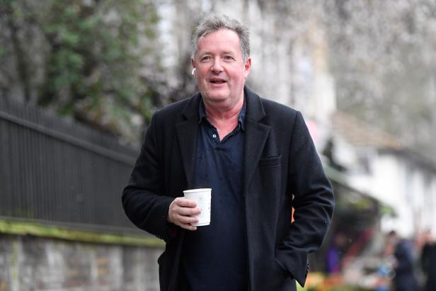 Piers Morgan walks near his house in London