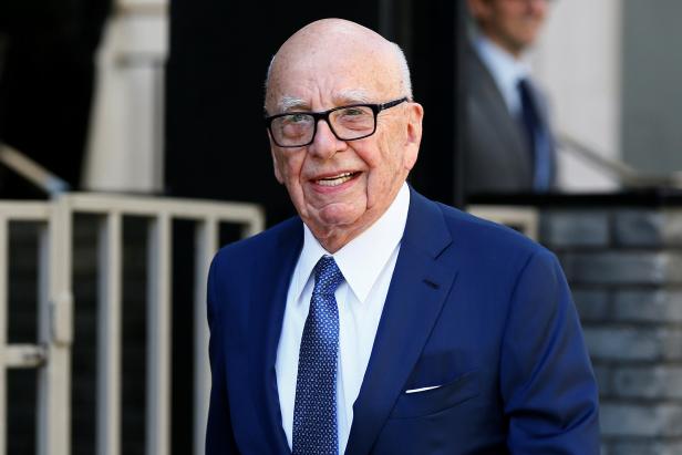 FILE PHOTO: Media mogul Rupert Murdoch leaves his home in London