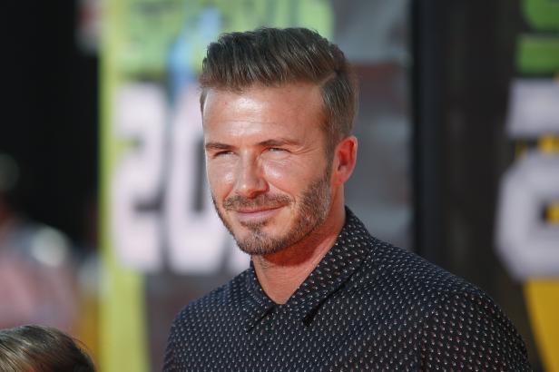David Beckham lächelt in die Kamera.