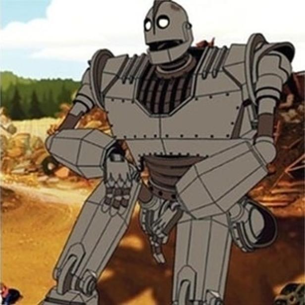 Der Iron Giant, eine animierte Roboterfigur, steht vor einem Schrottplatz.