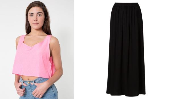 Eine Frau mit einem rosa Top und eine lange, schwarze Rock sind zu sehen.