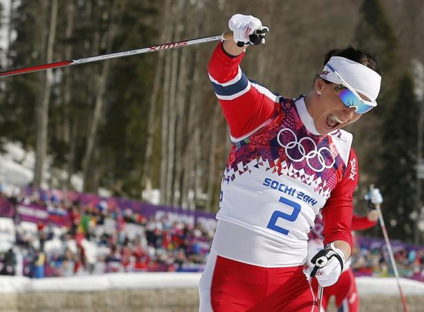 Marit Bjørgen jubelt bei den Olympischen Winterspielen 2014 in Sotschi.
