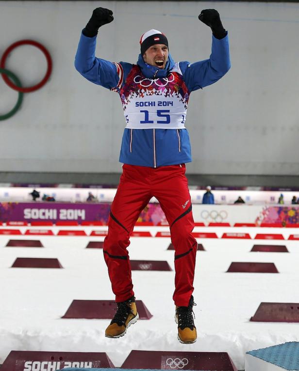 Ein jubelnder Skispringer bei den Olympischen Winterspielen in Sotschi 2014.