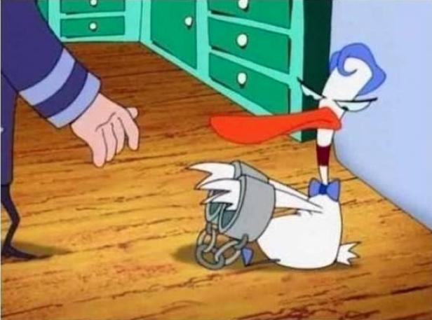 Eine Zeichentrickente ist gefesselt und geknebelt.