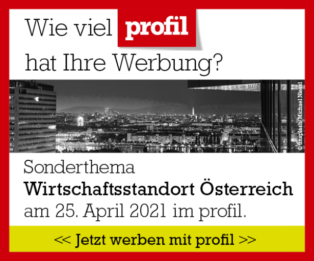 Eine nächtliche Skyline von Wien mit dem Prater im Hintergrund.