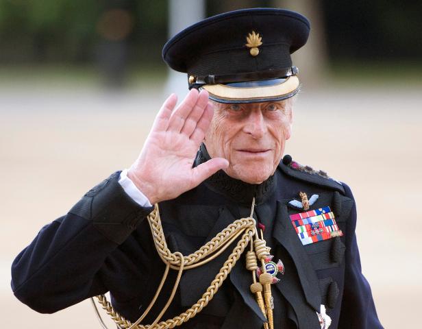 FILE PHOTO: Britain's Prince Philip arrives on the eve of his birthday to take the salute of the Household Division Beating Retreat on Horse Guards Parade in London