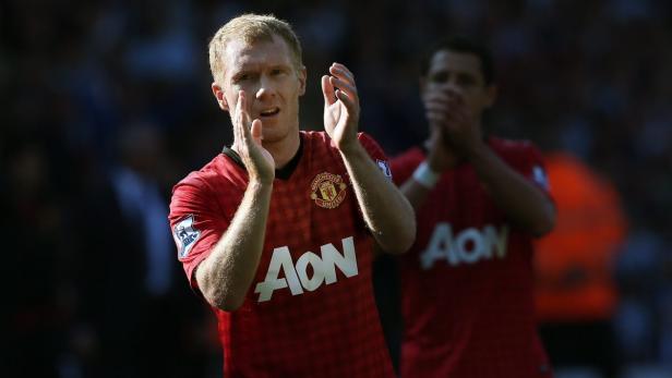 Paul Scholes klatscht Beifall im Trikot von Manchester United.