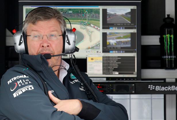 FILE PHOTO: File photo of Mercedes Formula One team principal Ross Brawn looking on during the first practice session of the German F1 Grand Prix at the Nuerburgring racing circuit