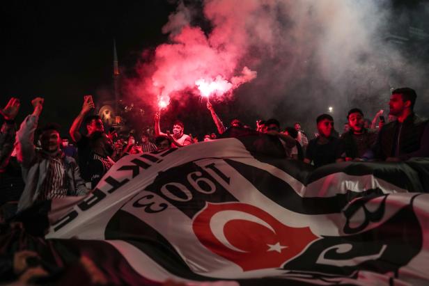 Besiktas' fans celebrate winning the Turkish Super League Championship 