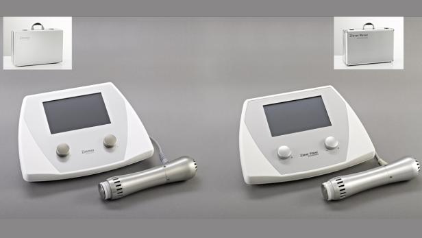 Zwei Ultraschalltherapiegeräte der Marken Zimmer und ZLaver Waver mit zugehörigen Transportkoffern.