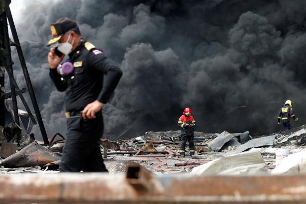 An explosion and fire destroy a factory in Samut Prakan, outside Bangkok