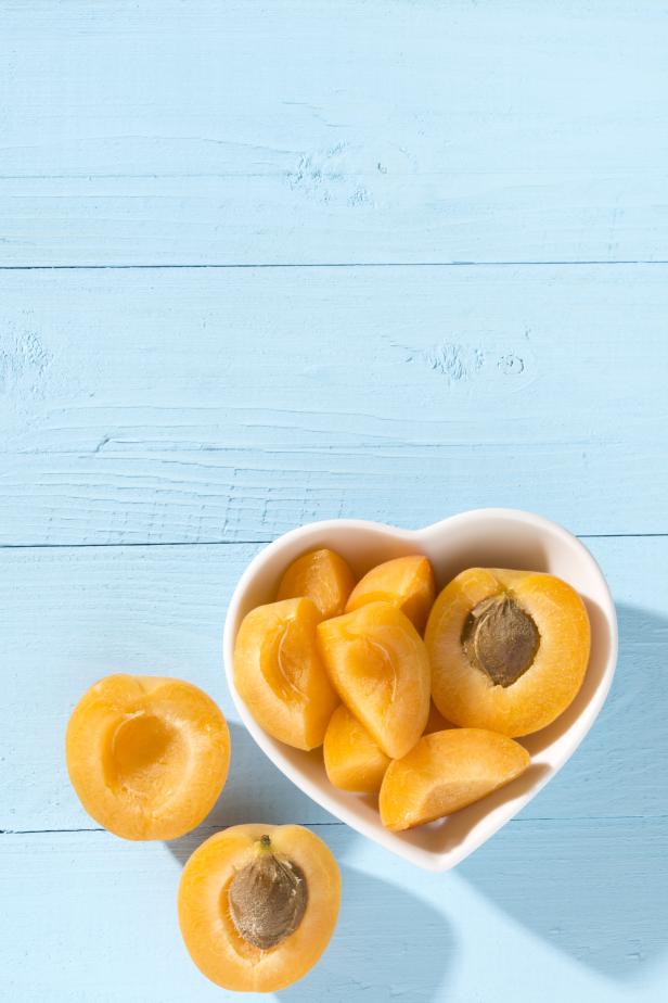 Apricots in a heart shaped bowl