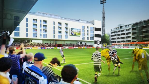 Ein Fußballspiel in einem Stadion mit Zuschauern und einem modernen Gebäude im Hintergrund.