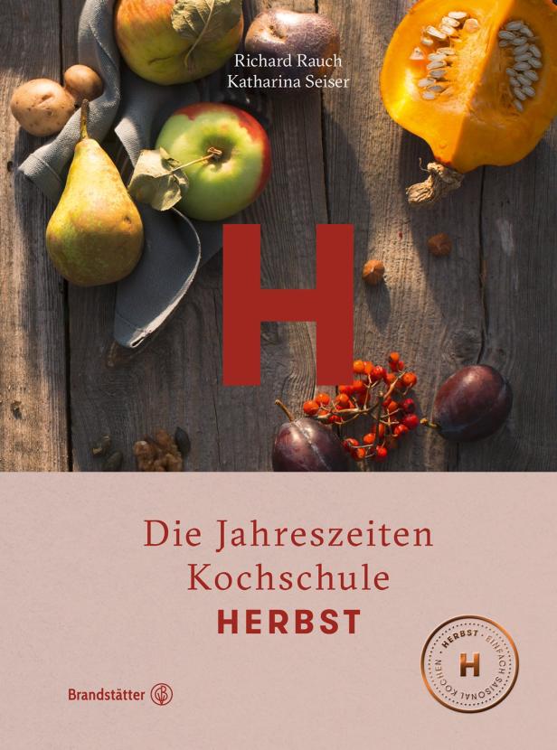 Das Cover des Buches „Die Jahreszeiten Kochschule – Herbst“ mit saisonalem Obst und Gemüse.