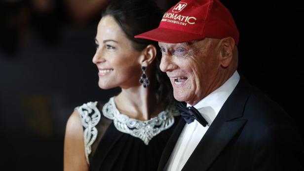 Niki Lauda mit seiner Frau auf einer Veranstaltung.