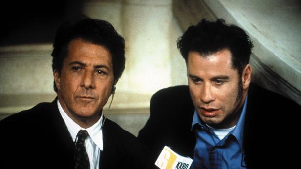 Dustin Hoffman und John Travolta bei einer Pressekonferenz.