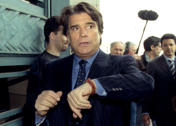 Former French tycoon Bernard Tapie arrives at court in a fraud trial over his defunct business empire
