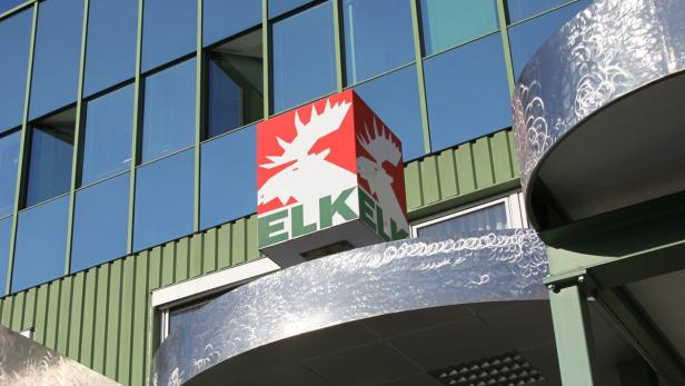 Das Logo von Elkell mit einem Elch auf einem Gebäude.
