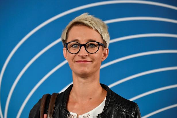 Nadine Schoen, member of the Christian Democratic Union (CDU) party's parliamentary group, poses for photographs after a news conference, in Berlin