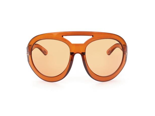Eine orangefarbene Pilotenbrille mit getönten Gläsern vor einem weißen Hintergrund.