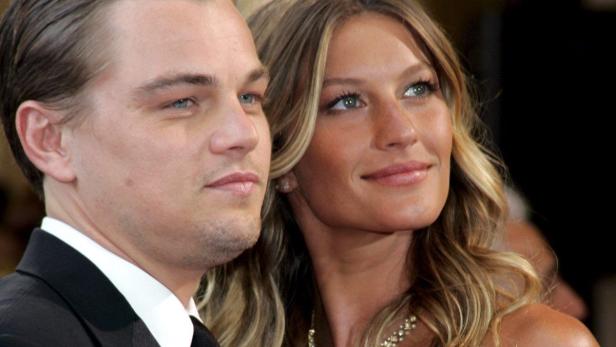 Leonardo DiCaprio und Gisele Bündchen posieren zusammen.