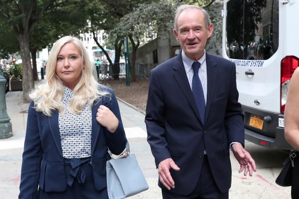 FILE PHOTO: Lawyer David Boies arrives with his client Virginia Giuffre for hearing in the criminal case against Jeffrey Epstein, who died this month in what a New York City medical examiner ruled a suicide, at Federal Court in New York