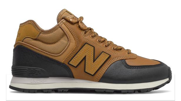 Ein brauner New Balance Sneaker mit schwarzem Detail und dem „N“-Logo an der Seite.