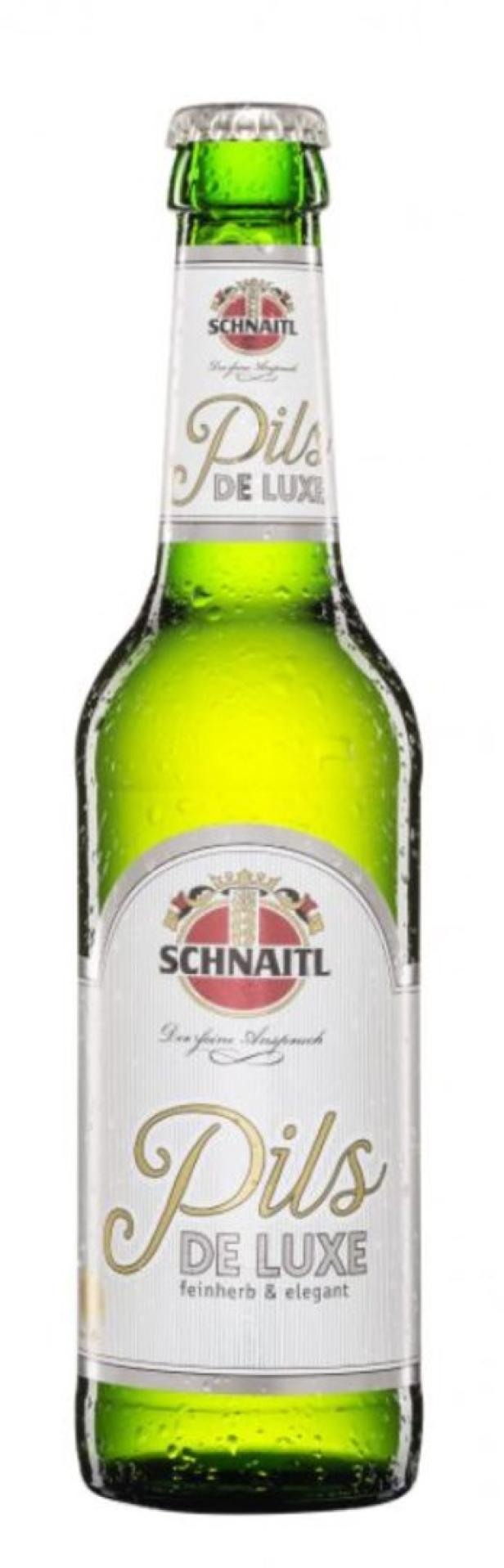 Eine Flasche Schnaitl Pils de Luxe, ein feinherbes und elegantes Bier.