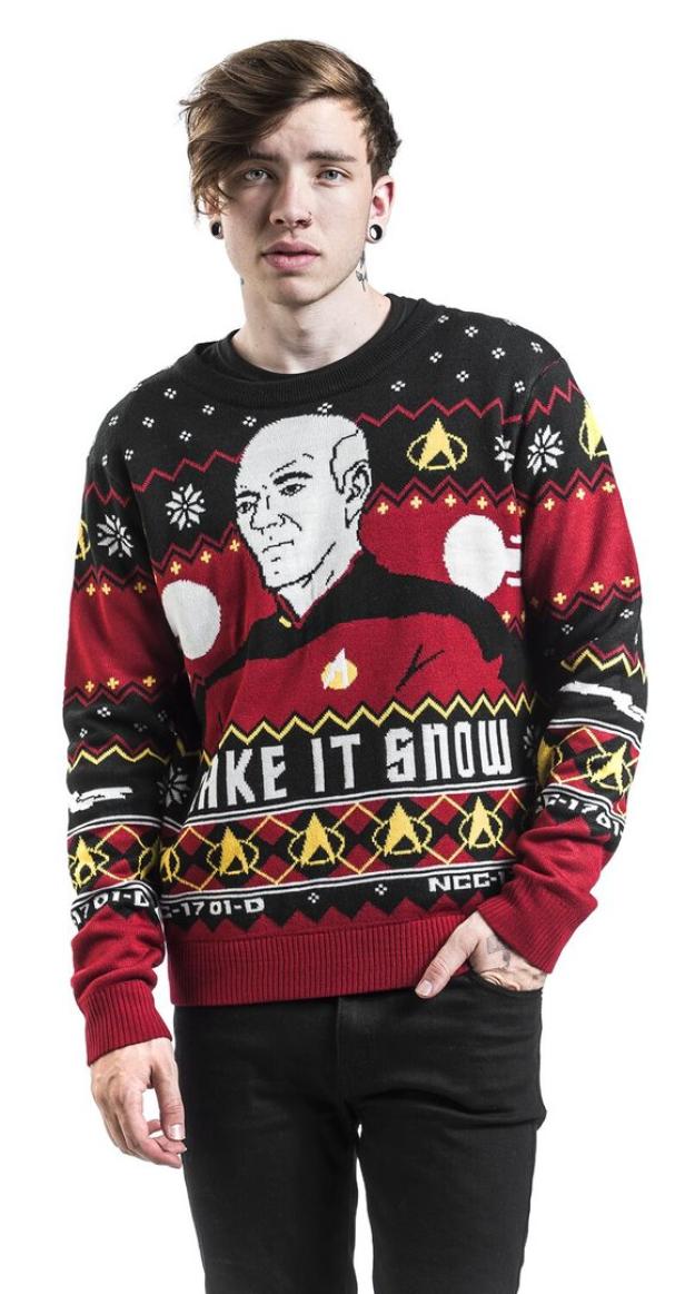 Ein Mann trägt einen „Star Trek“-Weihnachtspullover mit dem Aufdruck „Make it Snow“.