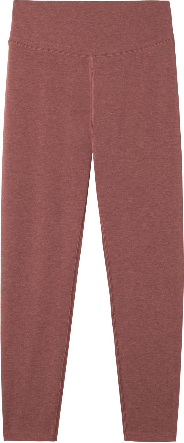Eine rosafarbene Leggings vor einem weißen Hintergrund.