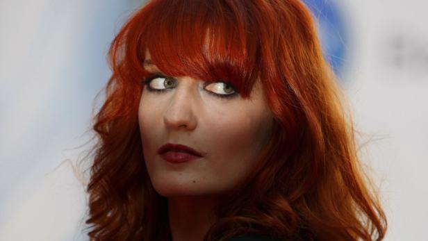 REUTERSBritish singer Florence Welch from the band Florence and The Machine arrives for the Mercury Prize awards in London September 8, 2009. REUTERS/Andrew Winning (BRITAIN ENTERTAINMENT IMAGES OF THE DAY)