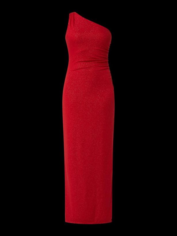 Ein rotes, glitzerndes, schulterfreies Abendkleid vor schwarzem Hintergrund.