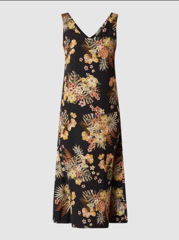 Ein ärmelloses, schwarzes Maxikleid mit tropischem Blumenmuster.