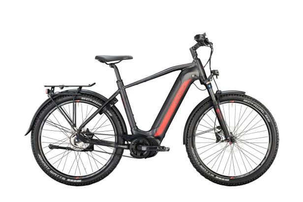 Ein graues Victoria E-Bike mit roten Akzenten steht vor einem weißen Hintergrund.