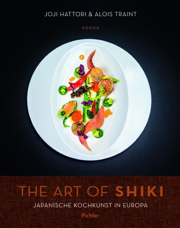 Cover des Buches „The Art of Shiki: Japanische Kochkunst in Europa“ mit einem Teller kunstvoll angerichteter Speisen.
