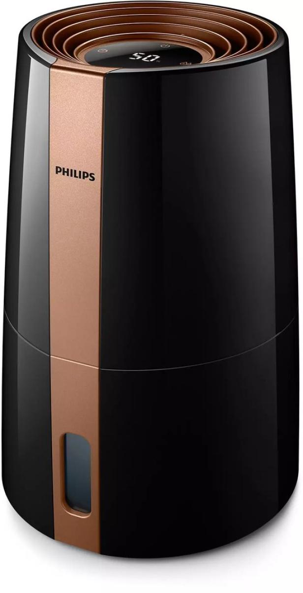 Ein Luftbefeuchter der Marke Philips in Schwarz und Kupferfarbe.