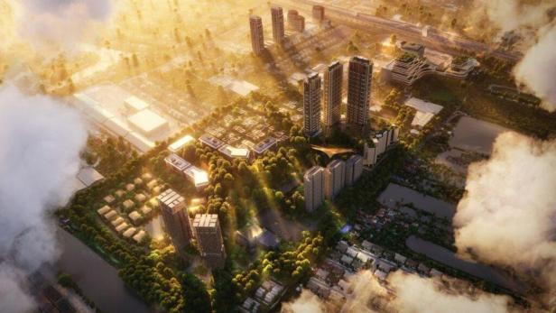 Eine Luftaufnahme von The Forestias, einer Wohnanlage mit Hochhäusern und viel Grün.