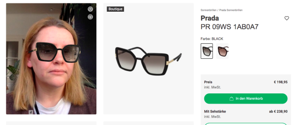 Eine Frau trägt eine schwarze Prada Sonnenbrille mit Farbverlaufgläsern.