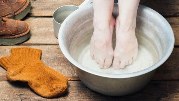 Feet in basin for footbath