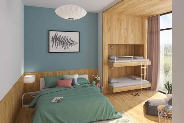 Ein Schlafzimmer mit Doppelbett und eingebautem Etagenbett.