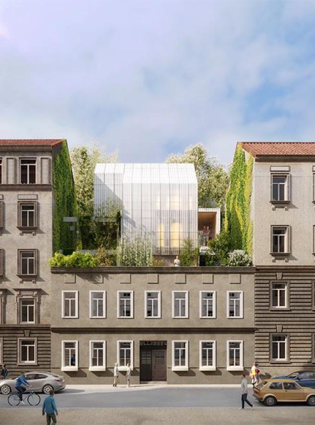 Ein modernes Stadthaus mit begrüntem Dachgarten zwischen zwei Altbauten.