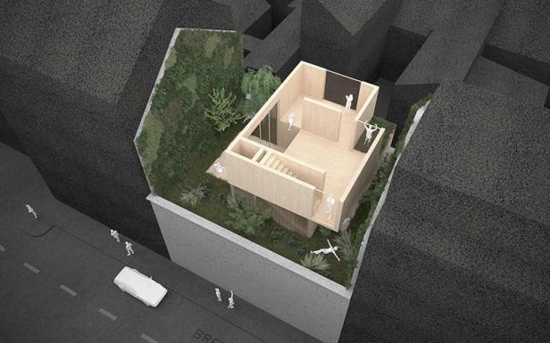 Ein Modell zeigt ein modernes Baumhaus in einer städtischen Umgebung.