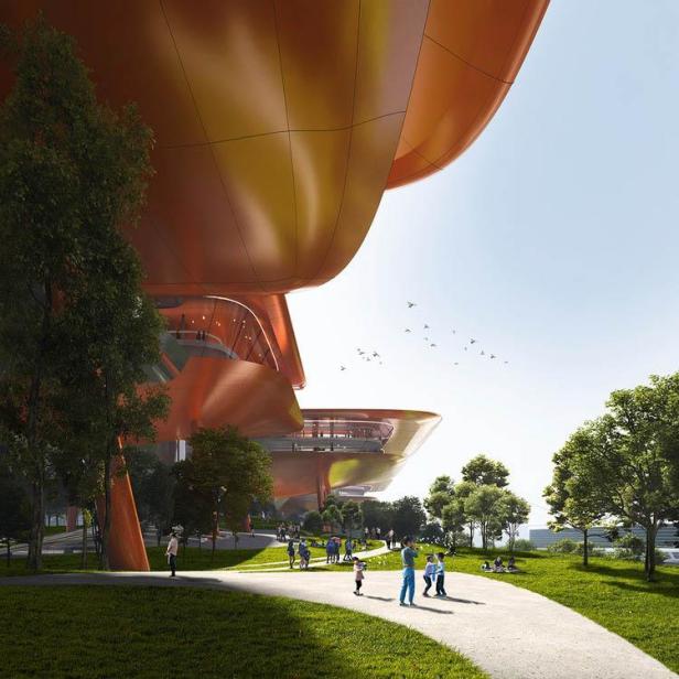 Das Chongqing Cuntan Cruise Terminal, ein futuristisches Gebäude, umgeben von einer Parkanlage mit Menschen.